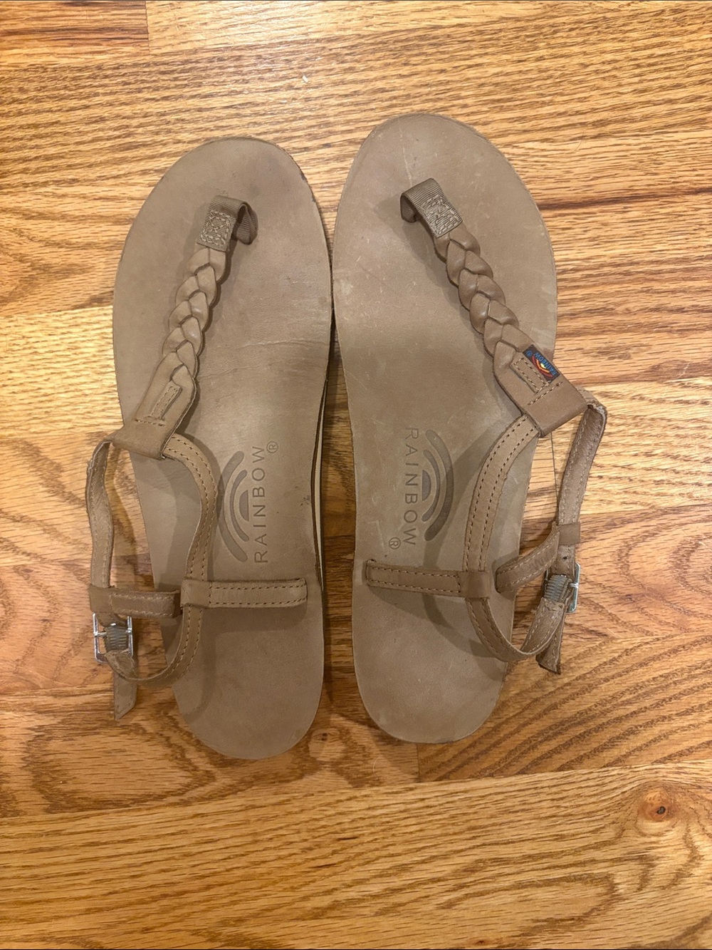 Rainbow Women's Braided T strap Sandal in Taupe Brown